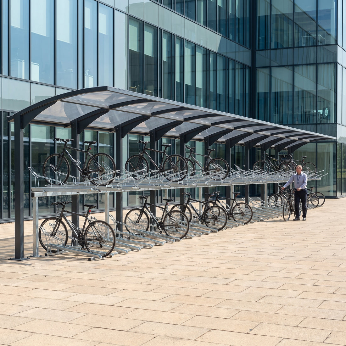 Rydale Cantilever two tier 100 bike shelter in RAL 7016 Anthracite Grey at a corporate office headquarters