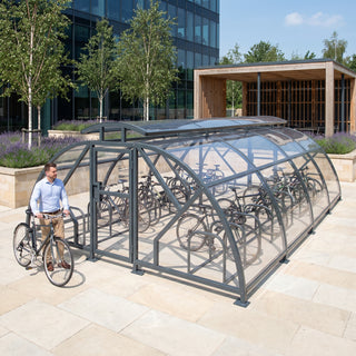 40 cycle Salisbury closed compound bike shelter with vented roof in RAL 7016 Anthracite Grey at a business park