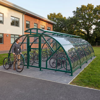 40 cycle Salisbury closed compound bike shelter with vented roof in RAL 6005 Moss Green at a school