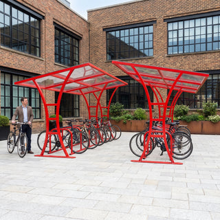 Double-sided 28 bike shelter in traffic red at a coworking campus