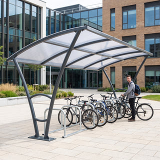 Armstrong 12 cycle 5m bike shelter in Anthracite Grey installed on a university campus with bicycles parked