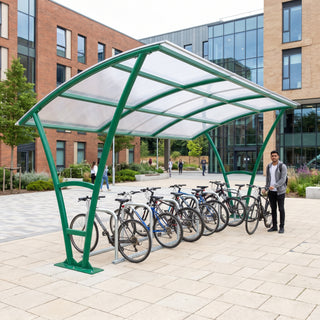 Armstrong 12 cycle 5m bike shelter in Traffic Green installed on a university campus with bicycles parked