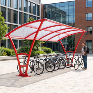 Armstrong 12 cycle 5m bike shelter in Traffic Red installed on a university campus with bicycles parked