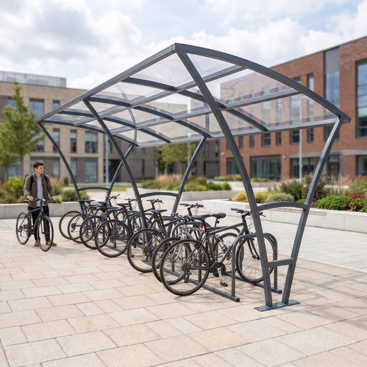 Armstrong 20 cycle bike shelter in Anthracite Grey on a university campus plaza with bicycles parked