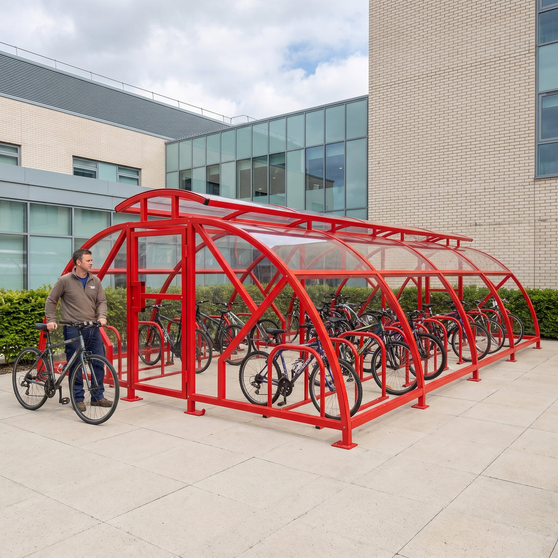 40 cycle Salisbury closed compound bike shelter with vented roof in red at a hospital