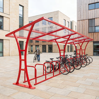 24 bike cycle shelter in traffic red at a university campus plaza